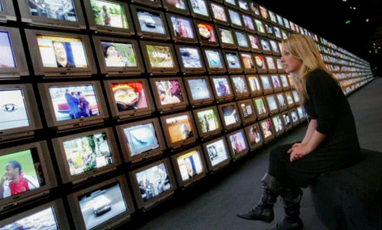 Viewer watching digital channels on tablet with IPTV connection